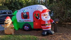 deccoration,fort wilderness,florida,decorations,camp site,orlando,fl,walt disney world,america,santa,merry christmas,campsite,places,inflatables southeast florida kissimmee walt disney worl Inflatable Christmas decorations at a campsite in Fort Wilderness campground at Walt Disney World in Orlando, Florida