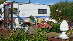 "Ornamental Garden,Blue,Camping,Camping Life,Canvas,Car,Chair,Cloud,Cloudscape,Comfortable,Decoration,Dutch Culture,Field,Flower,Flower Bed,Formal Garden,Grass,Green,Holiday,Journey,Leisure Activity,Lifestyle,Lifestyles,Luxury,Mobile Home,Mobile Home,Nature,Nature,Netherlands,Non-Urban Scene,Outdoors,Park,People Traveling,Plant,Recreational Pursuit,Relaxation,Resting,Retirement,Rural Scene,Sand,Sand Dune,Single Object,Sky,Summer,Summer",Tourist,Traditional Culture,Travel,Travel Destinations,Tree,Two Objects,Vacations,Vehicle Trailer,campingsite Camping site # 10