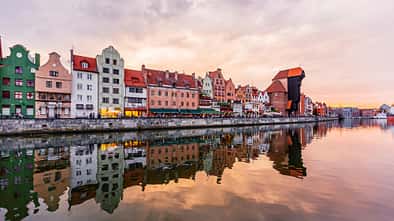 Gdansk skyline at sunset seen at the waterfront of Motlawa river, Gdansk, Poland