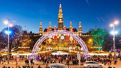 rathausplatz,neon Christmas market on Rathausplatz in Vienna at Christmas Eve
