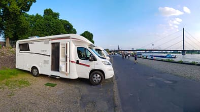 A motorhome parked at the Duesseldorfer Rheinuferpromenade motorhome park. Duesseldorf, North Rhine-Westphalia, Germany