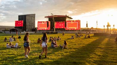 READING, ENGLAND - AUGUST 24: General view of festival campers exploring the Arena space ahead of thhe main show day at Reading Festival 2023 at Richfield Avenue on August 24, 2023 in Reading, England. (Photo by Joseph Okpako/WireImage)