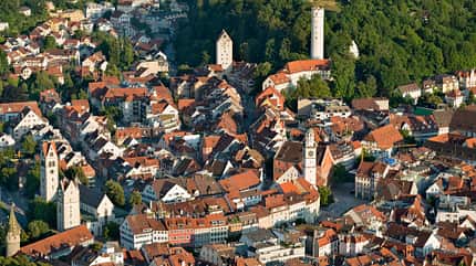 landmark,no people,built structure,building,Travel,outdoor,Architecture,city,urban scene,day,Tree,Upper Swabia,house,Germany,Baden-Wuerttemberg,Ravensburg,city view,Old Town,history,historical,tower,town tower,forest,elevated view,birds eye view,aerial view Germany, Baden-Wuerttemberg, Ravensburg, town towers in old town