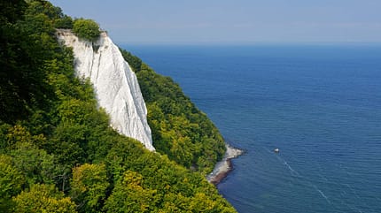 no people,Travel,rock,sky,landscape,coast,island,outdoor,day,scenics,Plant,Tree,nature,beauty of nature,impressive,tranquility,vastness,cliff coast,rocky coast,Koenigsstuhl,chalk cliff,Steep Coast,UNESCO World Heritage Site,Unesco World Heritage Natural Site,water,sea,Jasmund National Park,chalk coast,Sea,Baltic Sea,Germany,Mecklenburg-Western Pomerania,Ruegen,Baltic Sea island,nature reserve,National Park Germany, Ruegen, Jasmund National Park, chalk cliff Koenigsstuhl