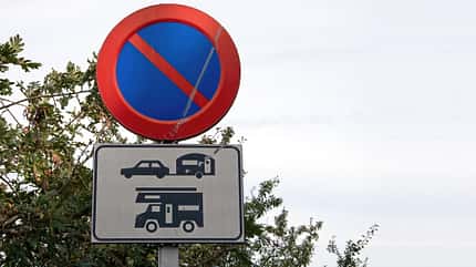 No parking for caravans and campervans traffic warning sign