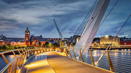 peace bridge,cycling bridge Northern Ireland Derry The Peace Bridge River Foyle Night Panorama Londonderry