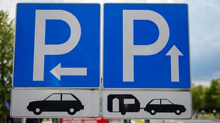 Parking sign at a rest stop on a highway in Austria