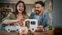 Young couple saving money for camper van road trip
