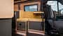 KEC Mountaineer Grand Expedition (2027) Loungebereich im KEC Mountaineer Grand Expedition mit ausziehbarer Sitzbank und Lagun-Tisch