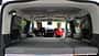 Campervan, Innenraum, Pärchen, Bett, drehbare Pilotensitze DAILYCAMPER VAN auf Opel Zafira Basis – kompakter Campervan in Kaolin-Weiß, 4,98 m Länge, 1,90 m Höhe, 180 PS Diesel, Automatik, Pkw-Zulassung