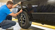 Mann, Auto, Reifen, Ma§band, Heft, Stift