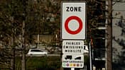 Low Emission Zone sign put up along the road. Traffic