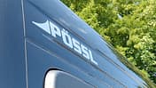 Pössl Logo auf der Tür